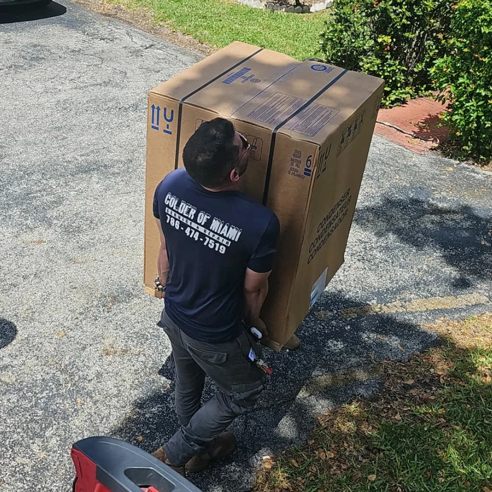 Yadiel from Colder of Miami personally delivering HVAC unit with care and professionalism in South Florida