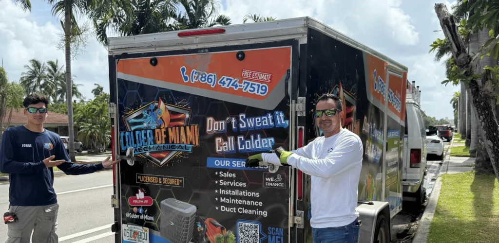 The Colder of Miami commercial HVAC team and wrapped service truck in South Florida